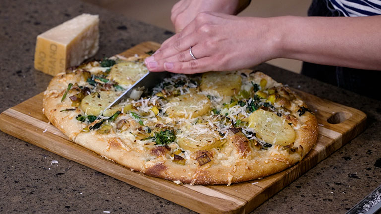 Broccoli Rabe, Leek, and Potato Pizza Screenshot from America's Heartland Season 18 Episode 09